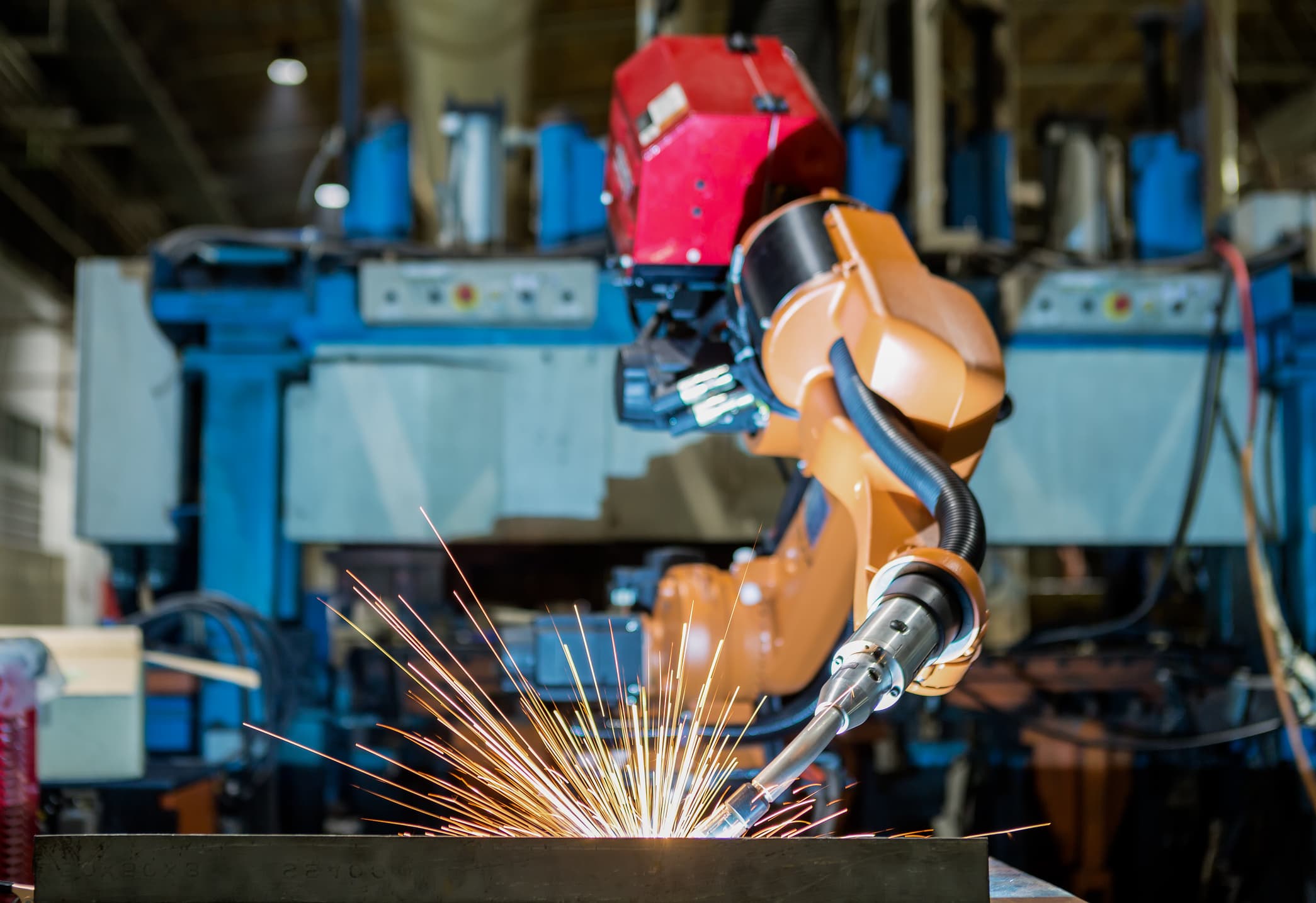 Robot welding in an industrial production environment